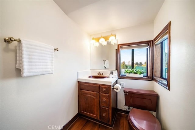 2008 S Bentley Ave Unit 5, Los Angeles, CA 90025 - half bathroom featuring vanity and wood finished floors