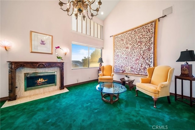 2008 S Bentley Ave Unit 5, Los Angeles, CA 90025 - sitting room featuring carpet floors, a chandelier, a premium fireplace, and high vaulted ceiling