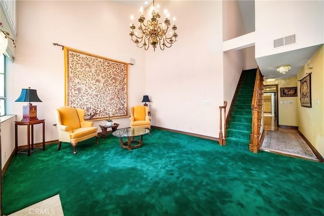 2008 S Bentley Ave Unit 5, Los Angeles, CA 90025 - sitting room with a chandelier, carpet, stairway, and a high ceiling