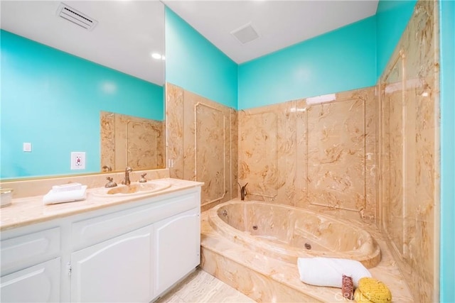 2008 S Bentley Ave Unit 5, Los Angeles, CA 90025 - bathroom with vanity and a whirlpool tub