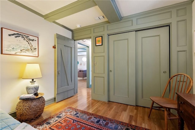 1521 5th St, Los Osos, CA 93402 - sitting room featuring light wood-style floors and crown molding