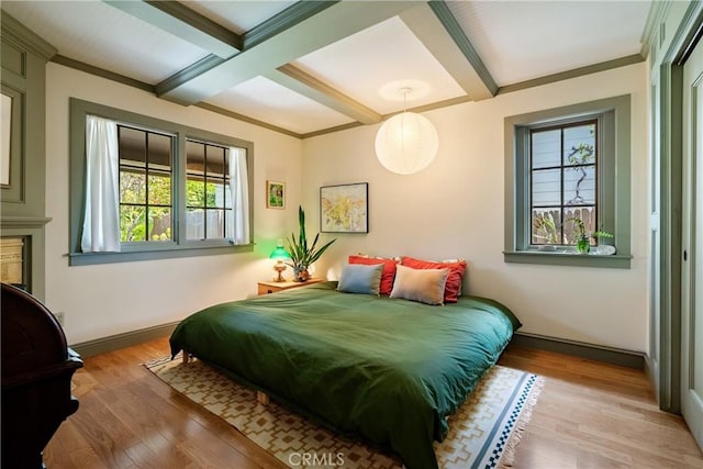 1521 5th St, Los Osos, CA 93402 - bedroom featuring multiple windows, coffered ceiling, wood finished floors, beamed ceiling, and ornamental molding