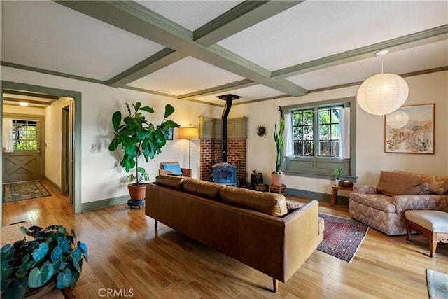 1521 5th St, Los Osos, CA 93402 - living area with a wood stove, light wood finished floors, beam ceiling, and coffered ceiling