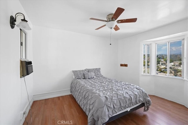 1745 College View Pl, Los Angeles, CA 90041 - bedroom with wood finished floors and ceiling fan