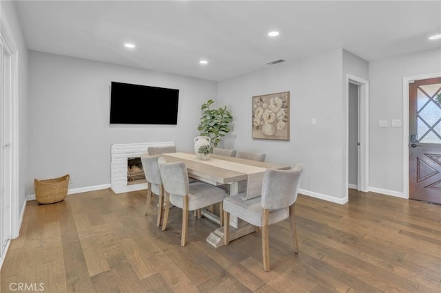 6721 E Coralite St, Long Beach, CA 90808 - dining area featuring wood finished floors and recessed lighting