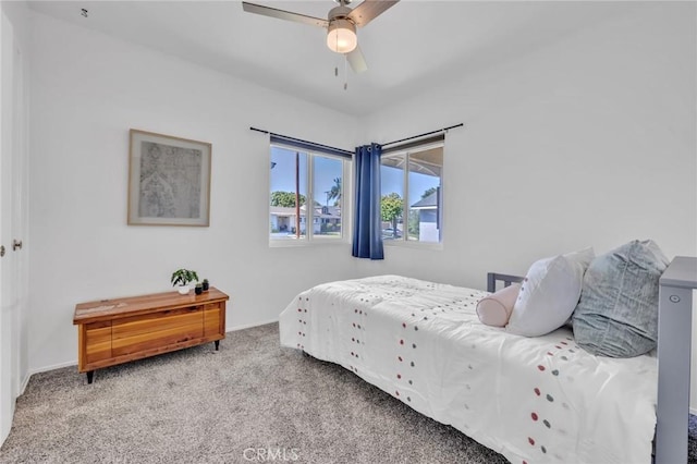 6721 E Coralite St, Long Beach, CA 90808 - carpeted bedroom featuring baseboards and a ceiling fan