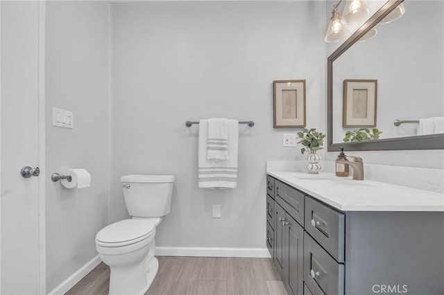 6721 E Coralite St, Long Beach, CA 90808 - bathroom featuring vanity and wood finished floors
