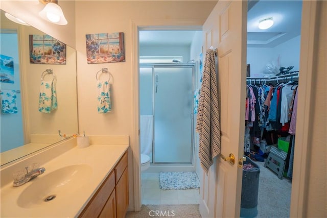 19078 Stoddard Way, Apple Valley, CA 92308 - bathroom with a stall shower, vanity, and a spacious closet