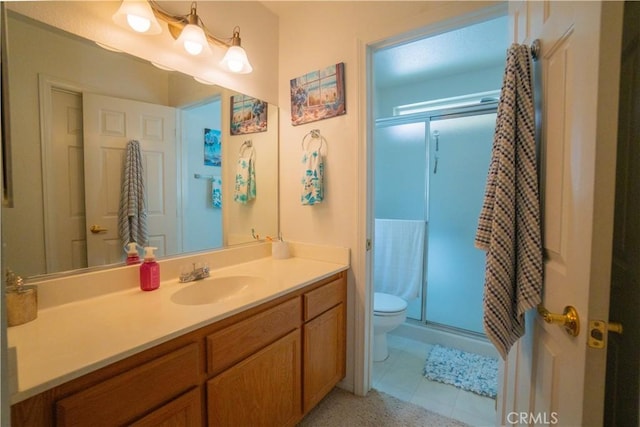 19078 Stoddard Way, Apple Valley, CA 92308 - bathroom featuring a stall shower, vanity, and tile patterned floors