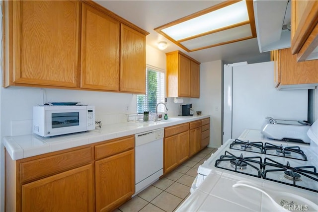 19078 Stoddard Way, Apple Valley, CA 92308 - kitchen featuring white appliances and light tile patterned floors
