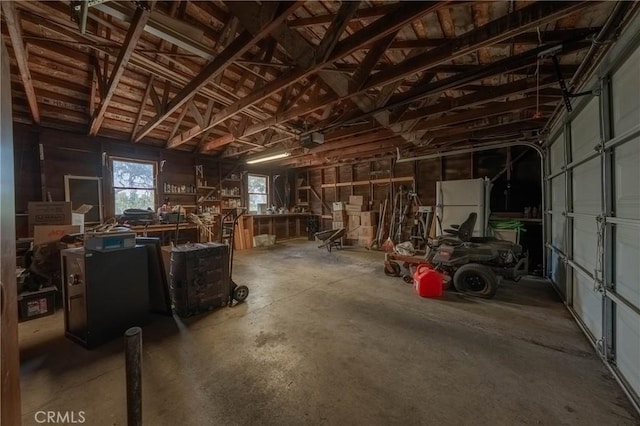 790 Manzanita St, Lakeport, CA 95453 - garage featuring freestanding refrigerator and a garage door opener