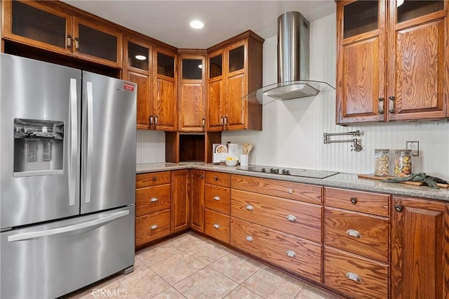 790 Manzanita St, Lakeport, CA 95453 - kitchen featuring stainless steel fridge, wall chimney exhaust hood, black electric stovetop, brown cabinetry, and recessed lighting