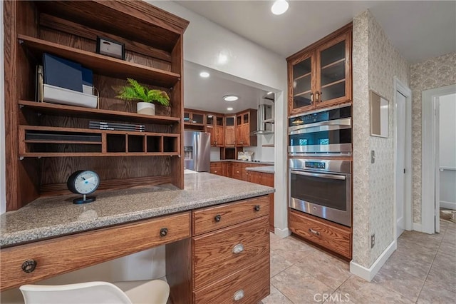 790 Manzanita St, Lakeport, CA 95453 - kitchen featuring appliances with stainless steel finishes, brown cabinets, open shelves, light tile patterned flooring, and wallpapered walls