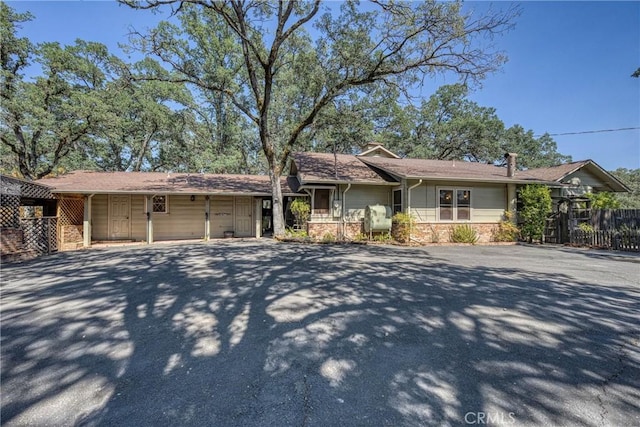 790 Manzanita St, Lakeport, CA 95453 - ranch-style house with driveway and stone siding