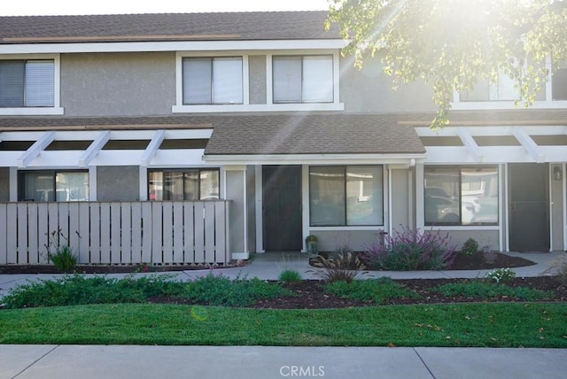 1193 E Foster Rd Unit C, Santa Maria, CA 93455 - view of front of house with stucco siding and a shingled roof