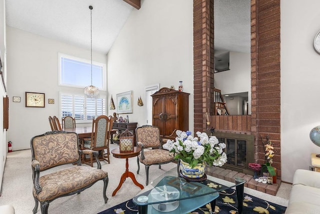 10323 Pine Grove St, Spring Valley, CA 91978 - carpeted living area with high vaulted ceiling, a brick fireplace, and beam ceiling