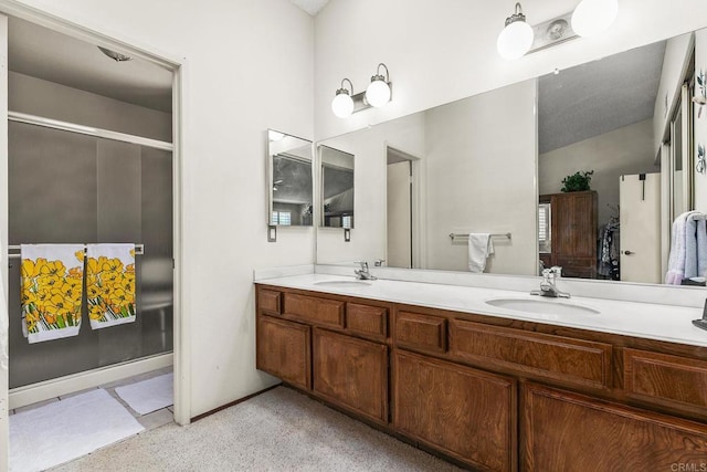 10323 Pine Grove St, Spring Valley, CA 91978 - full bathroom with double vanity and an enclosed shower