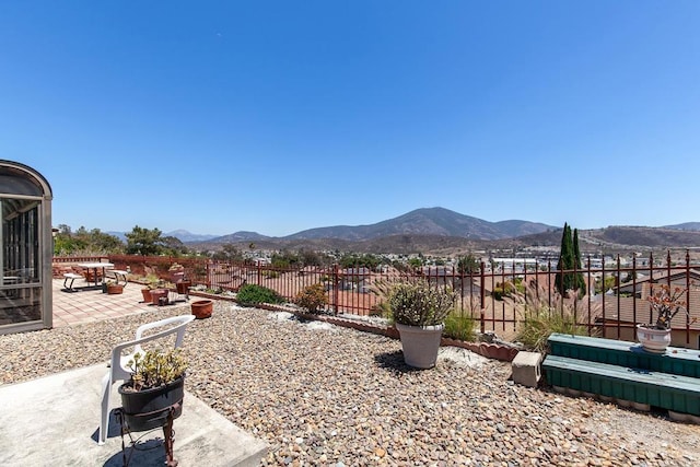 10323 Pine Grove St, Spring Valley, CA 91978 - fenced backyard featuring a mountain view and a patio area