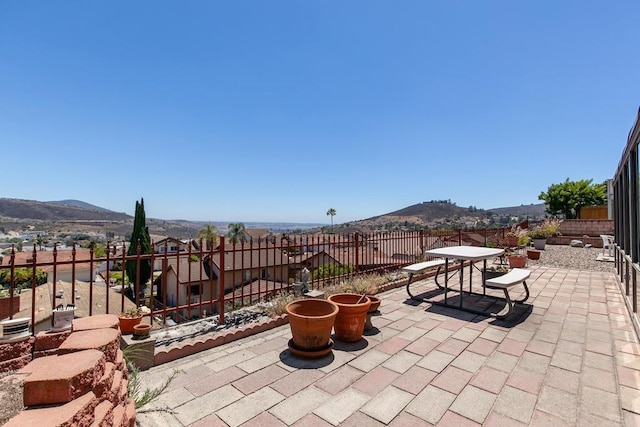 10323 Pine Grove St, Spring Valley, CA 91978 - view of patio / terrace with a mountain view and outdoor dining area