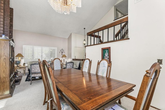 10323 Pine Grove St, Spring Valley, CA 91978 - dining space featuring a chandelier, carpet floors, and high vaulted ceiling