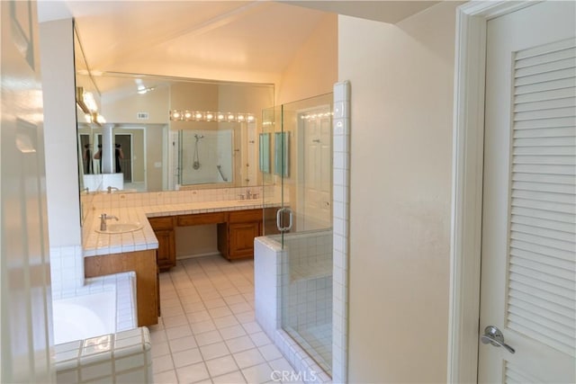 23169 Mulholland Dr Unit 3, Woodland Hills, CA 91364 - full bathroom with a stall shower, double vanity, tile patterned floors, and vaulted ceiling