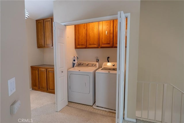 23169 Mulholland Dr Unit 3, Woodland Hills, CA 91364 - laundry room with washing machine and clothes dryer and cabinet space