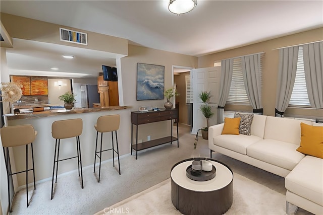 23169 Mulholland Dr Unit 3, Woodland Hills, CA 91364 - living area featuring light colored carpet and baseboards