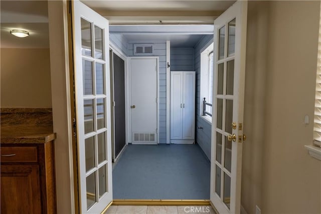 23169 Mulholland Dr Unit 3, Woodland Hills, CA 91364 - hallway with carpet and french doors