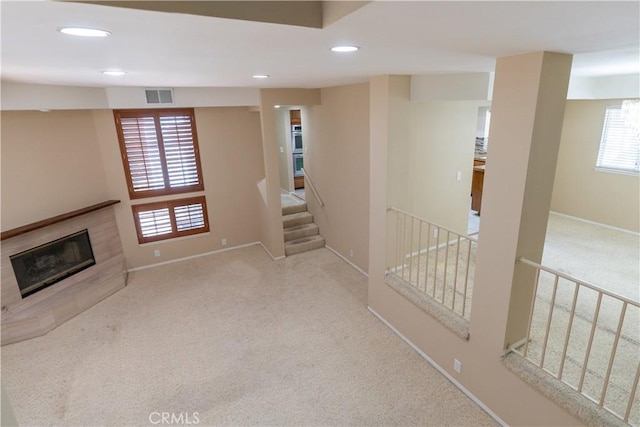 23169 Mulholland Dr Unit 3, Woodland Hills, CA 91364 - below grade area featuring carpet flooring, a fireplace, recessed lighting, and stairs