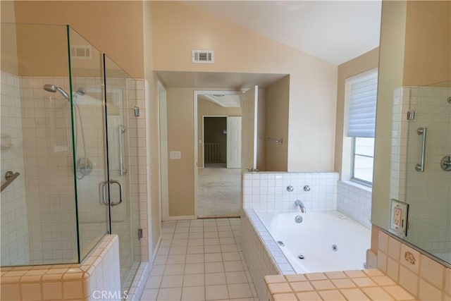23169 Mulholland Dr Unit 3, Woodland Hills, CA 91364 - full bath with vaulted ceiling, a shower stall, a whirlpool tub, and tile patterned floors
