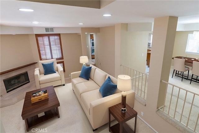 23169 Mulholland Dr Unit 3, Woodland Hills, CA 91364 - carpeted living room featuring recessed lighting and a glass covered fireplace