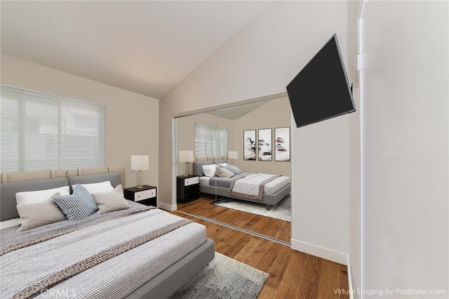 5473 Twin Lakes Dr, Cypress, CA 90630 - bedroom featuring wood finished floors, lofted ceiling, and a closet