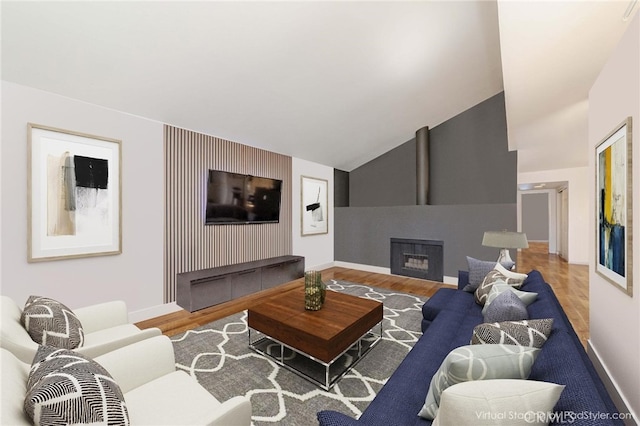 5473 Twin Lakes Dr, Cypress, CA 90630 - living room with wood finished floors, a fireplace, and lofted ceiling