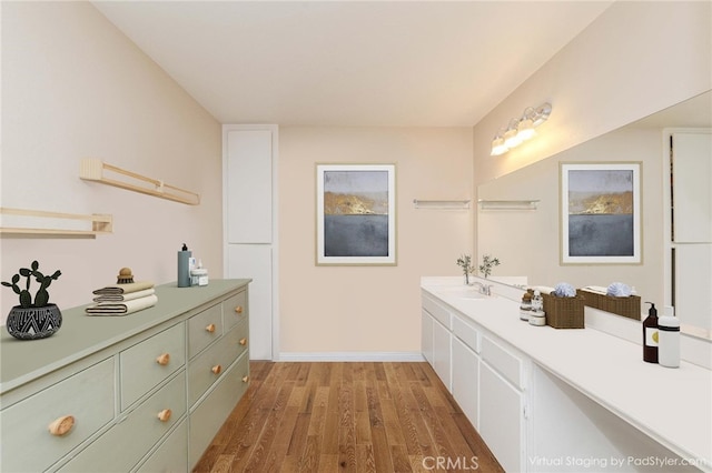 5473 Twin Lakes Dr, Cypress, CA 90630 - bathroom with wood finished floors and vanity