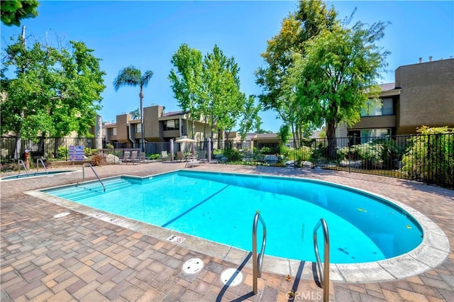 5473 Twin Lakes Dr, Cypress, CA 90630 - community pool with a residential view and a patio