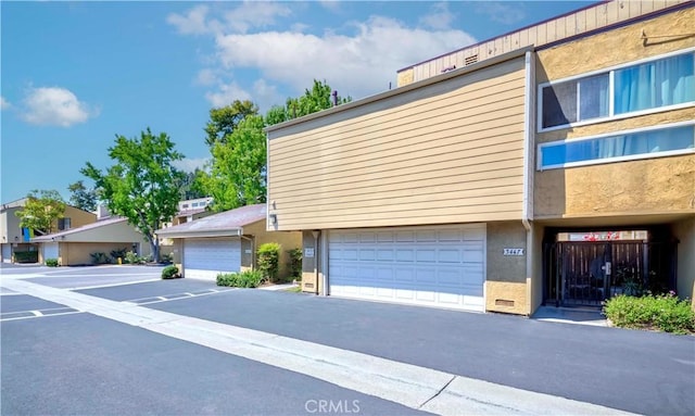 5473 Twin Lakes Dr, Cypress, CA 90630 - view of front of house featuring stucco siding