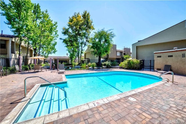 5473 Twin Lakes Dr, Cypress, CA 90630 - community pool featuring a patio area and a residential view