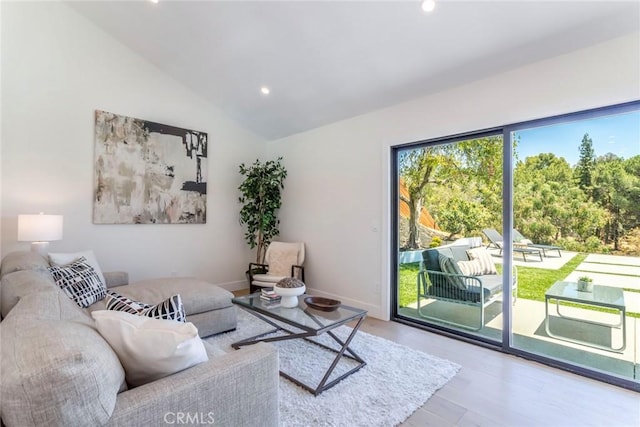 12350 Mclennan Ave, Granada Hills, CA 91344 - living room featuring recessed lighting and lofted ceiling