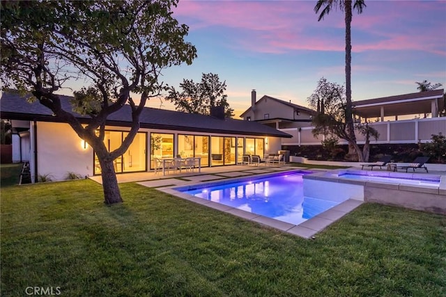 12350 Mclennan Ave, Granada Hills, CA 91344 - view of pool with a pool with connected hot tub, outdoor lounge area, and a patio area