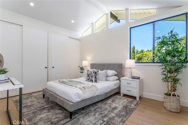 12350 Mclennan Ave, Granada Hills, CA 91344 - bedroom with light wood finished floors, a closet, and recessed lighting