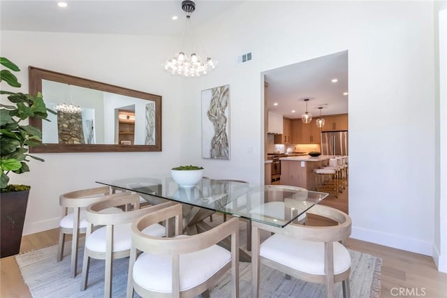 12350 Mclennan Ave, Granada Hills, CA 91344 - dining area with light wood-style flooring, a chandelier, and recessed lighting
