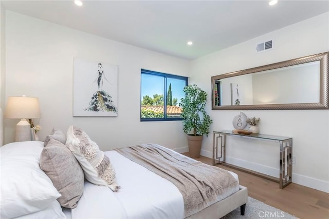 12350 Mclennan Ave, Granada Hills, CA 91344 - bedroom with recessed lighting and wood finished floors