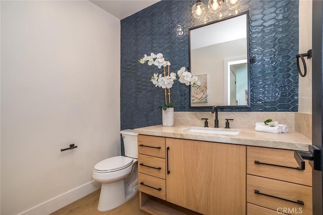 12350 Mclennan Ave, Granada Hills, CA 91344 - bathroom featuring vanity and wood finished floors