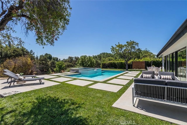 12350 Mclennan Ave, Granada Hills, CA 91344 - view of pool featuring a patio area, an outdoor living space, a lawn, and a pool with connected hot tub