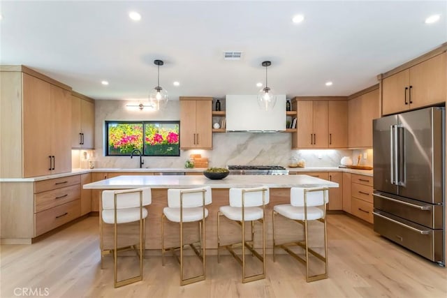 12350 Mclennan Ave, Granada Hills, CA 91344 - kitchen featuring high quality fridge, open shelves, light countertops, custom range hood, and a center island
