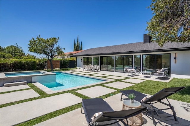 12350 Mclennan Ave, Granada Hills, CA 91344 - view of pool with a patio area, a pool with connected hot tub, and an outdoor hangout area