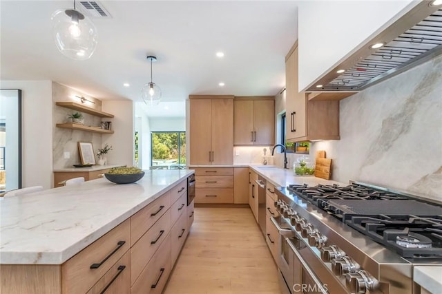12350 Mclennan Ave, Granada Hills, CA 91344 - kitchen featuring light brown cabinets, custom exhaust hood, light wood-style flooring, recessed lighting, and decorative light fixtures