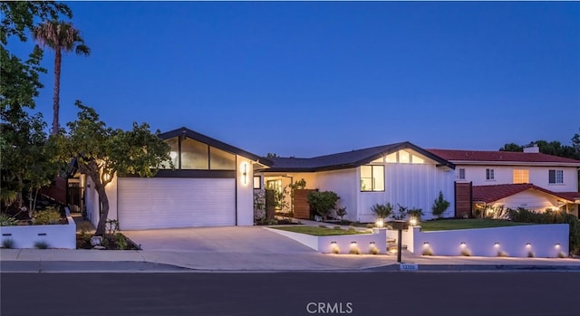 12350 Mclennan Ave, Granada Hills, CA 91344 - view of front of house with an attached garage and concrete driveway