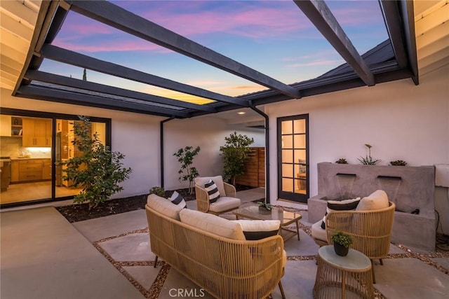 12350 Mclennan Ave, Granada Hills, CA 91344 - patio terrace at dusk featuring outdoor lounge area and a patio area