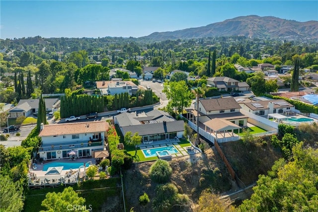 12350 Mclennan Ave, Granada Hills, CA 91344 - aerial view of residential area with a pool area and mountains